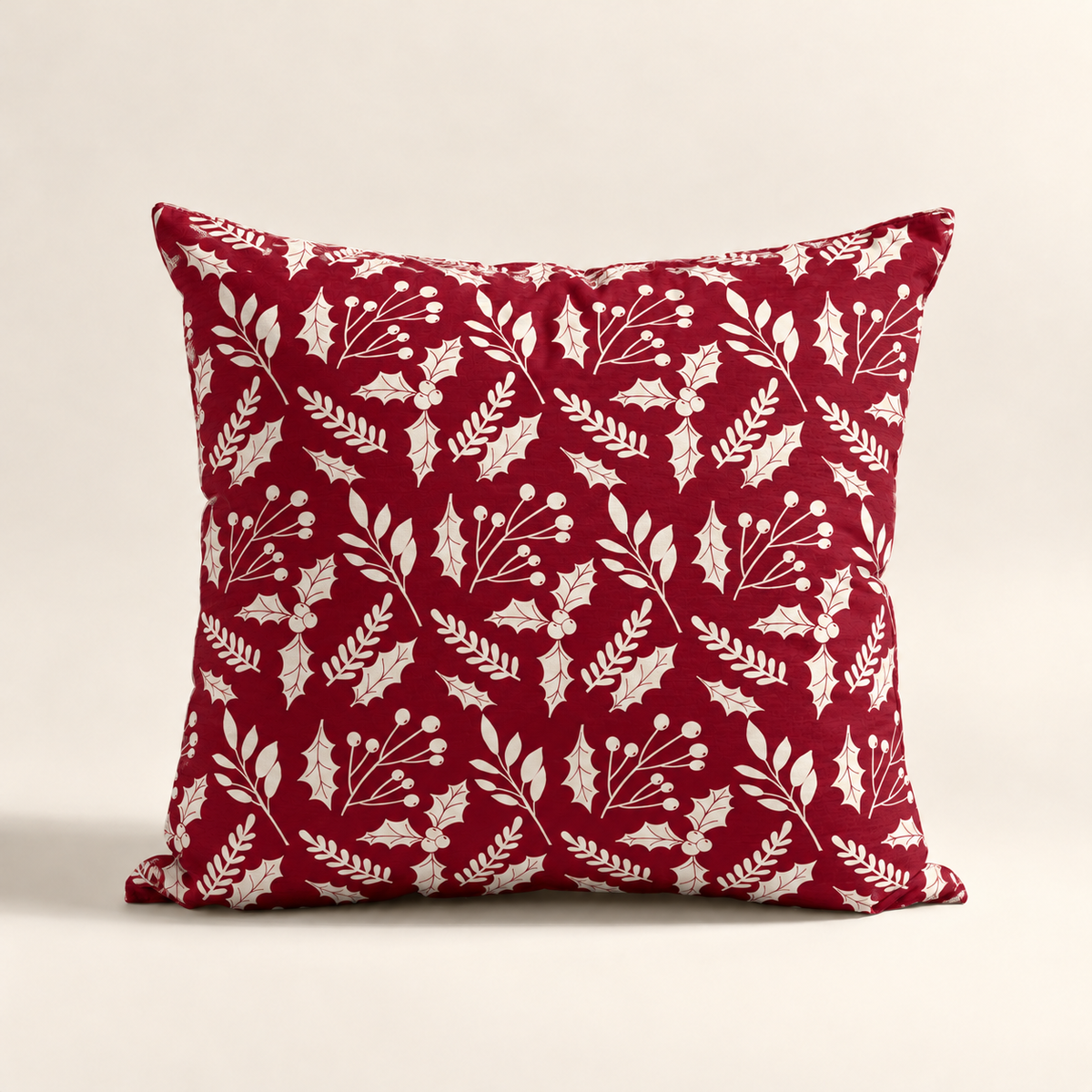 Cojin navideño burgundy con diseño botánico moderno