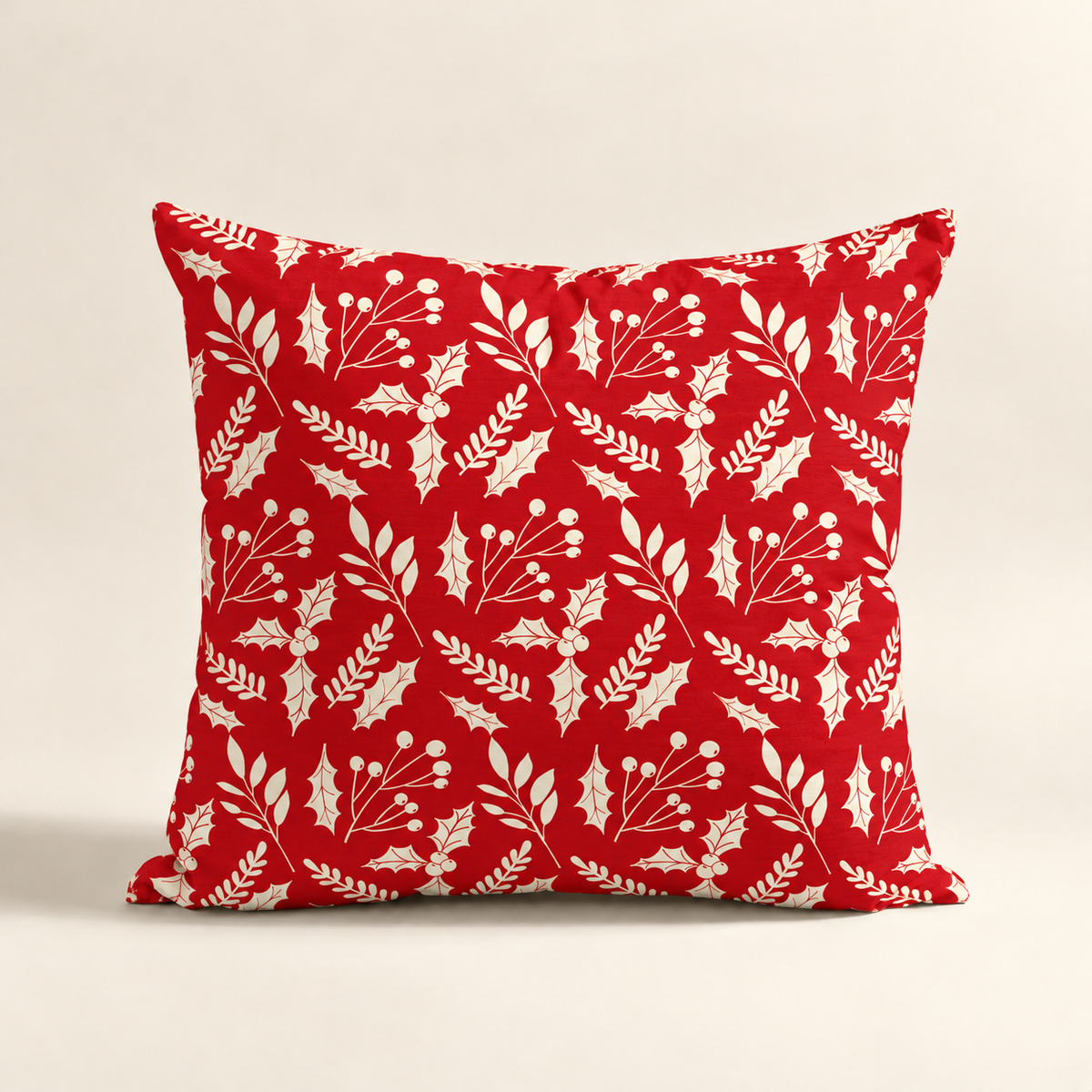Cojin navideño rojo con diseño botánico moderno