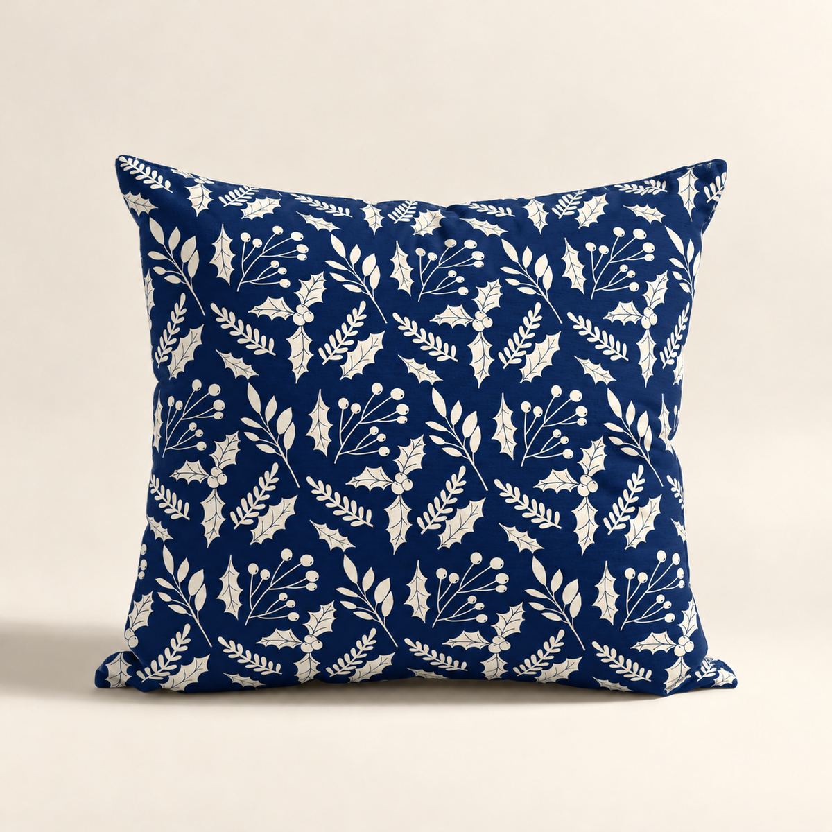 Cojin navideño azul con diseño botánico moderno